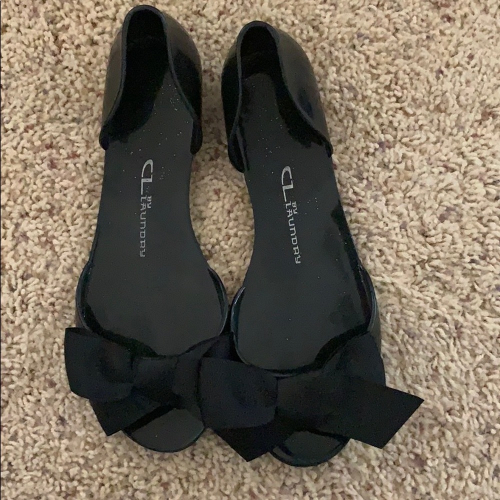 Black open toe shoes with bow.  Used once.